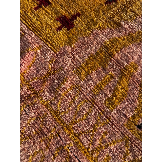 This authentic Moroccan Boujad rug is a striking handcrafted textile from central Morocco, woven entirely by hand using...