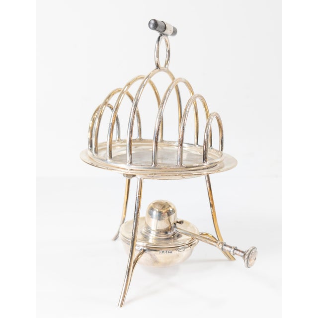 We are selling this stylish English Silverplate toast warmer by Asprey of London. This toast warmer has great Georgian...