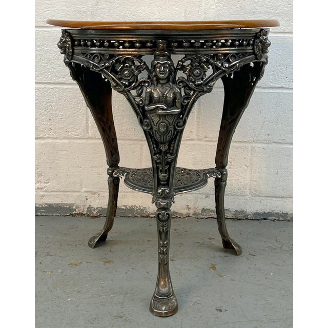 Add authentic 19th-century charm to your space with this antique Victorian “Britannia” pub table, a classic example of...