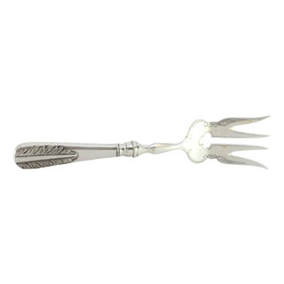 Silver Fish Serving Fork with Floral Motifs in Relief on the Handle For Sale