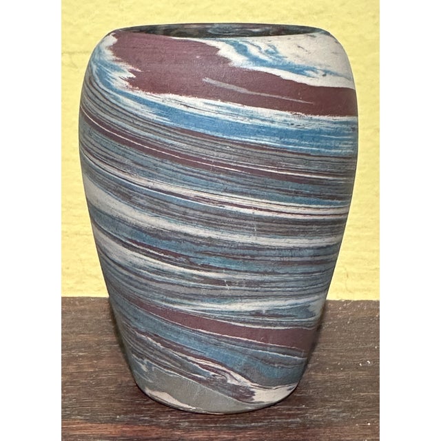 Here we have a super hand made Niloak pottery vase with swirls circling , very good cond with no damage at all , 3.75"...