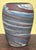 Here we have a super hand made Niloak pottery vase with swirls circling , very good cond with no damage at all , 3.75"...