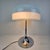 Very nice table lamp, fabricated in Italy in the 70's. It is made in the manner of Guzzini. The elegant shape makes it...