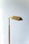 A simple elegant floor lamp by the Belgian company Belgo Chrom. It contains a small footswitch in a matching colour with...