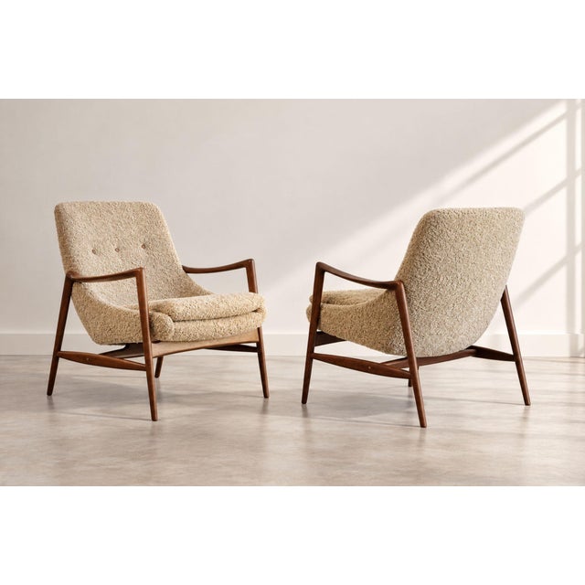 An exceptional pair of 1950s Norwegian lounge chairs designed by Rolf Rastad and Adolf Relling for Dokka Møbler. Each...
