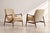 An exceptional pair of 1950s Norwegian lounge chairs designed by Rolf Rastad and Adolf Relling for Dokka Møbler. Each...