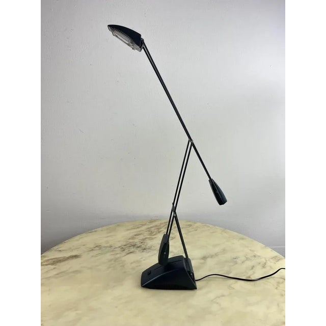 Articulated table lamp with halogen light from the 70s Integral and functioning with dual lighting modes. Good condition,...