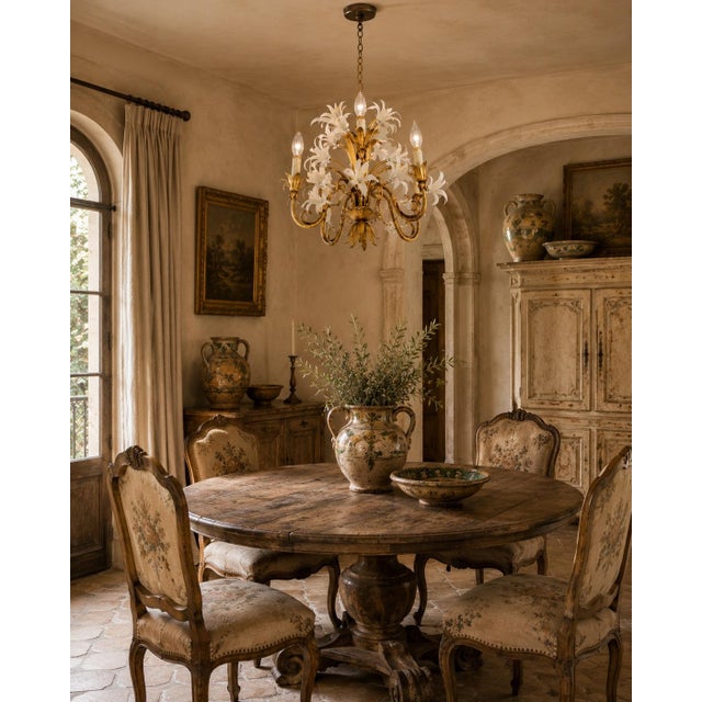 A romantic and highly decorative vintage Italian gilt tole chandelier, dating to the 1960s and designed in the glamorous...