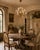 A romantic and highly decorative vintage Italian gilt tole chandelier, dating to the 1960s and designed in the glamorous...
