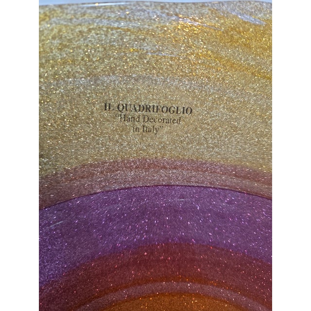 Hand-decorated Italian glass platter by Il Quadrifoglio, featuring luminous layers of gold, amethyst, and warm copper...
