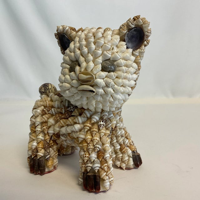We fell in love with this little guy. An adorable kitten figurine in a seashell Trompe l’Oeil style. He has cute little...