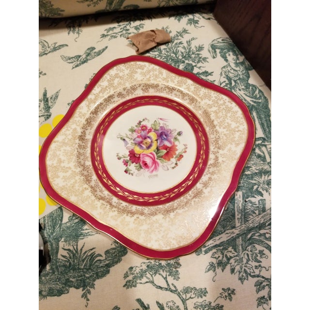 Beautiful antique royal Worcester Hand painted floral square plates .Each one signed Freeman.