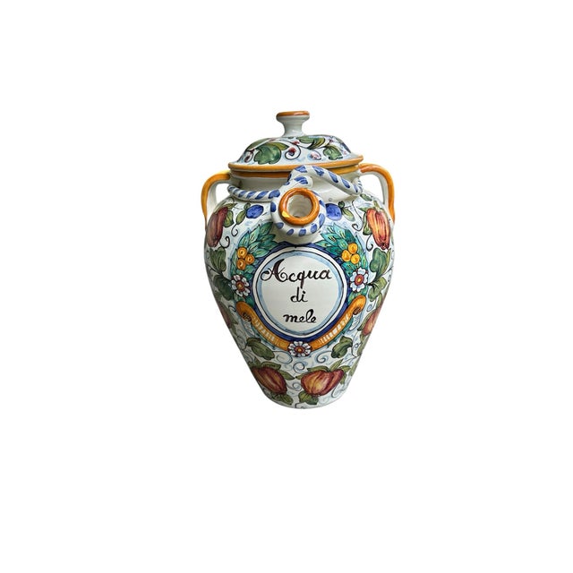 Crafted by the esteemed IMA (Ceramiche Artistiche) workshop in Montelupo Fiorentino, this piece is a masterclass in...