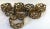 Nice set of eight woven metal pattern napkin rings!