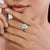 This cocktail ring featuring a 1.51 carat natural cabochon oval cut turquoise, set in 14k white gold. The center stone...