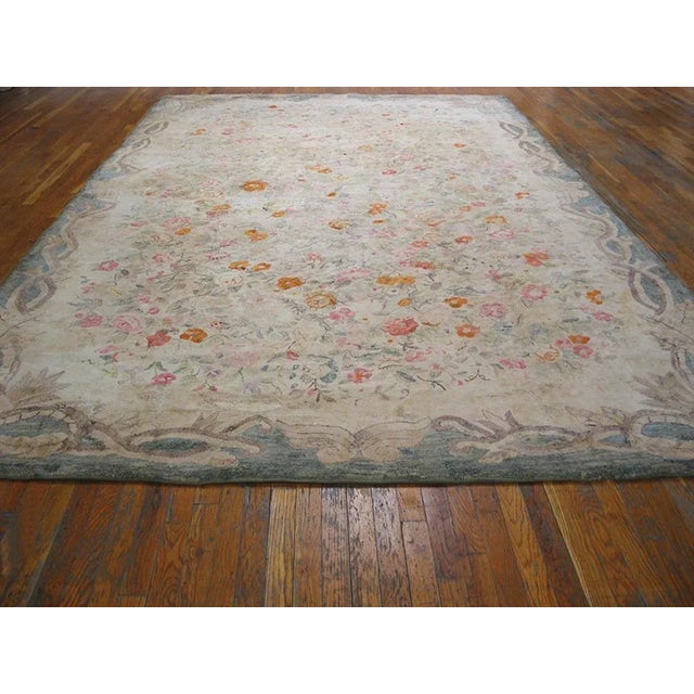 Antique American hooked rug, size: 8'2" x 13'0".