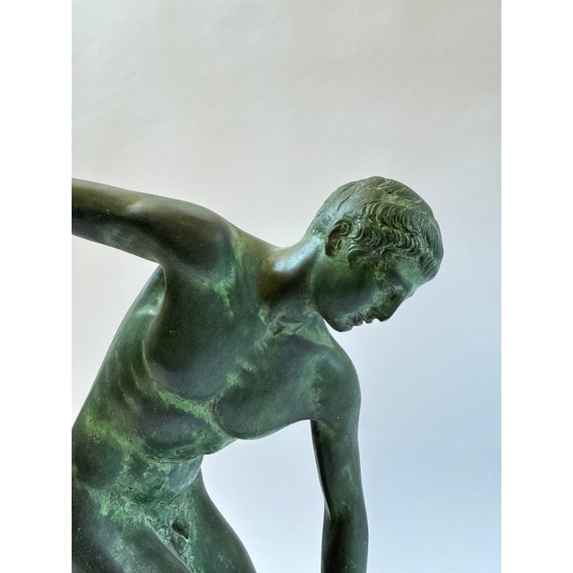 This finely cast 17-inch bronze sculpture depicts the iconic Discobolus (Discus Thrower), one of the most celebrated...