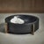 This bowl has a rich and classy look and works for various purposes. Crafted from marble, this round bowl sits atop a gold...