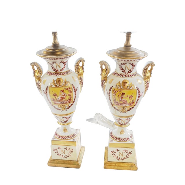 Pair of 19th century gold gilt porcelain European vases converted into a lamp. N Napoleon mark on stand and on back of the...
