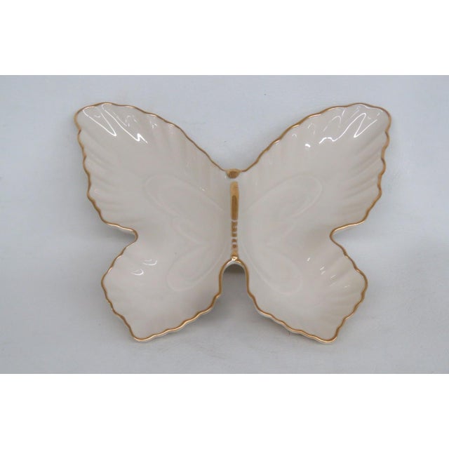 This beautiful Butterfly Tray is made of ivory porcelain. This piece is stamped as being made in the USA by Lenox with a...
