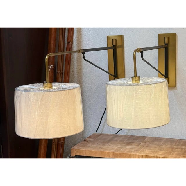 Design Plus Gallery presents a Pair of Anthony Swivel Sconces from Arteriors Home. The traditional design of these sconces...