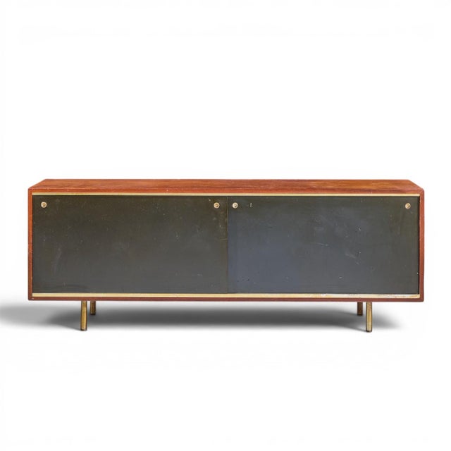 George Nelson for Herman Miller 8000 Executive Series Mid Century Walnut Credenza This credenza measures: 70 wide x 18.5...