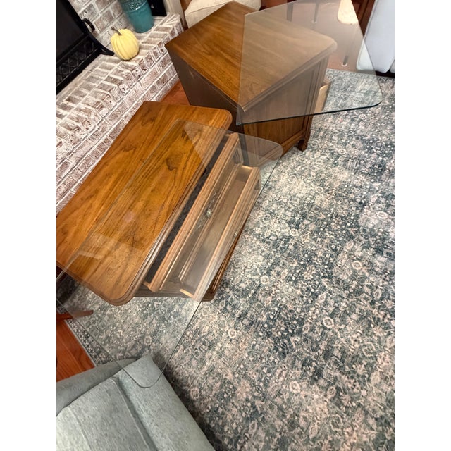 Bring warmth, timeless detail, and practical storage to your home with this matching pair of vintage nightstands from...