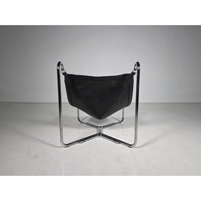 Baffo lounge chair by Gianni Pareschi and Ezio Didonè for Busnelli, Italy, 1969. Sculptural chromed tubular steel frame...