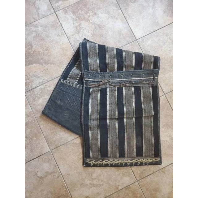 A wonderful Turkish Kilim / Kelim wool camel saddle bag from the early/mid 20th century. It is two bags connected together...