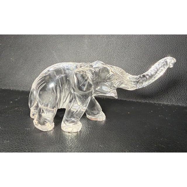 Up for sale is a lovely antique hand carved Chinese elephant clear rock crystal sculpture. This intricate and detailed...