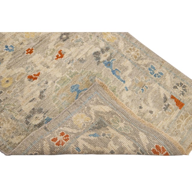 Beautiful modern Sultanabad hand-knotted wool runner with a beige field. This Sultanabad runner has a beige frame and...