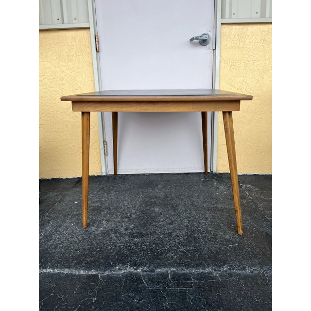 Mid century Modern foldable / collapsable dining set / game table. The table fold flat for easy storage when not in use....
