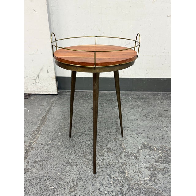 Design Plus Gallery presents the Tripod Side Table + Wood Tray from West Elm. Designed with a compact profile, this...