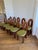 10 like new lightly used Giancarlo Valle dining chairs in Vintage moss and mahogany wood. Original owner with receipt.