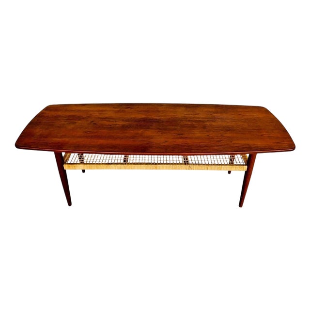 Vintage Danish Teak Coffee Table with Woven Rattan Magazine Shelf, 1960s For Sale