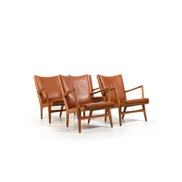 Set of four easy chairs, model ap-16 by hans j. Wegner for ap stolen denmark 1951. Made in oak and cognac leather. Teak...