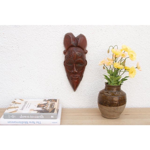 This charming Kwele mask from Gabon or the Republic of Congo is a delightful example of African tribal art. The mask is...