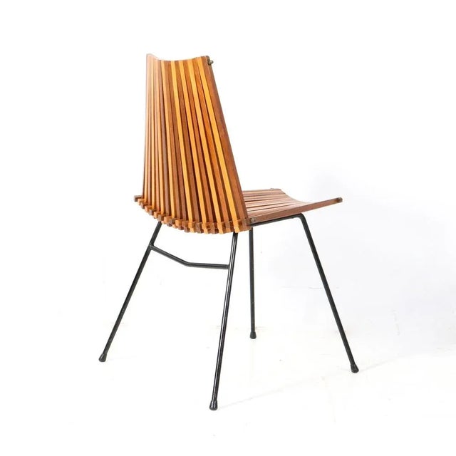 Magnificent and rare Mid-Century Modern model 218 side chair. Design by Dirk van Sliedregt for Rohé Noordwolde. Striking...