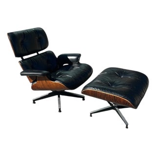 Herman Miller Eames Lounge Chair & Ottoman in Rosewood and Black Leather For Sale