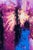 Emerging Monoliths presents a vibrant interplay of deep purples and striking blues, creating a dynamic landscape that...