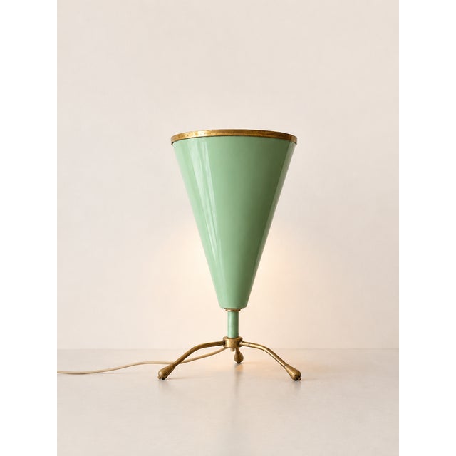 An exceptional Italian tripod table lamp from the 1950s. Historically known as a "television lamp," it was originally...
