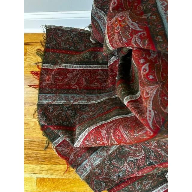 Beautiful antique Victorian paisley shawl circa 1850-1900.The piece measures approximately 66" square and features a...