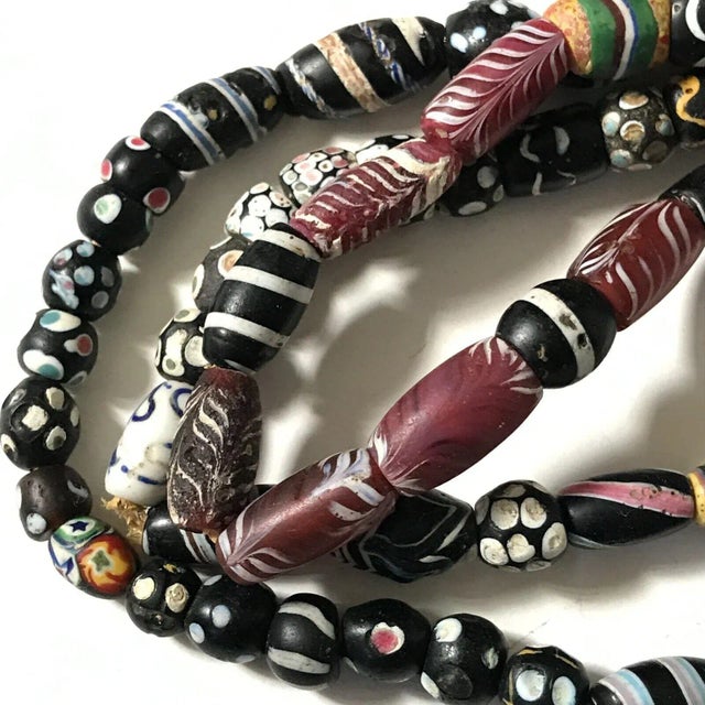 Early 20th Century Venetian Feather Striped Skunk Thousand Eye Millefiori African Trade Glass Beads For Sale In San Francisco - Image 6 of 11