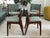 Set of four sculptural Mid-Century Modern Danish dining chairs, Model 89, attributed to Erik Buch. Solid rosewood frames,...