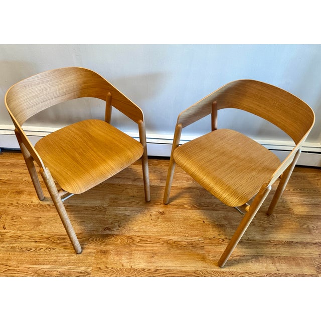 Item Description A pair of Stephanie Jasny for Punt Mobles "Mava" armchairs crafted with a stylish mid-century modern type...