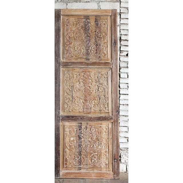 Add old-world charm and artisan elegance to your space with these vintage carved double front doors finished in a soft...