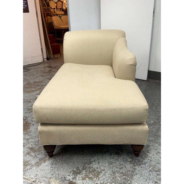 Design Plus Gallery presents a Classic Roll-Arm Chaise Lounge by Baker Furniture Company. This upholstered chaise has a...