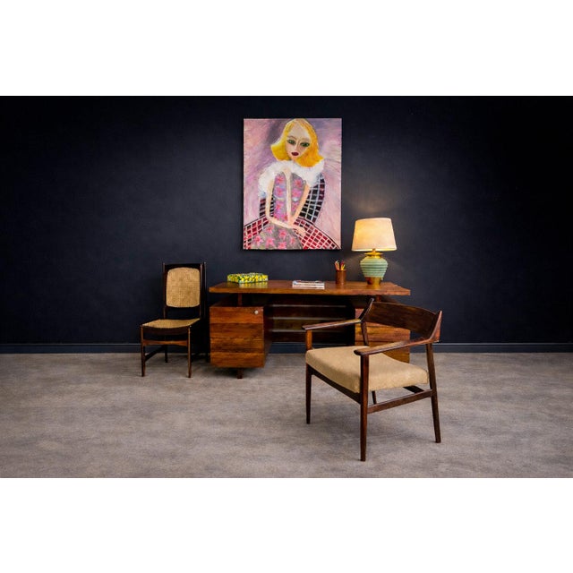This pair of pen holders reflects the restrained utility and material integrity associated with Brazilian modern desk...