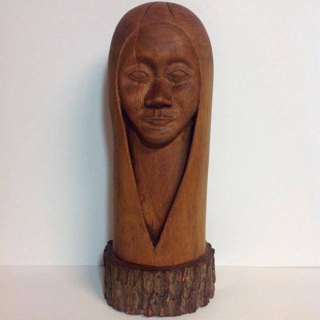 This figural wood carving is carved from one piece by hand. Ultra Cool!