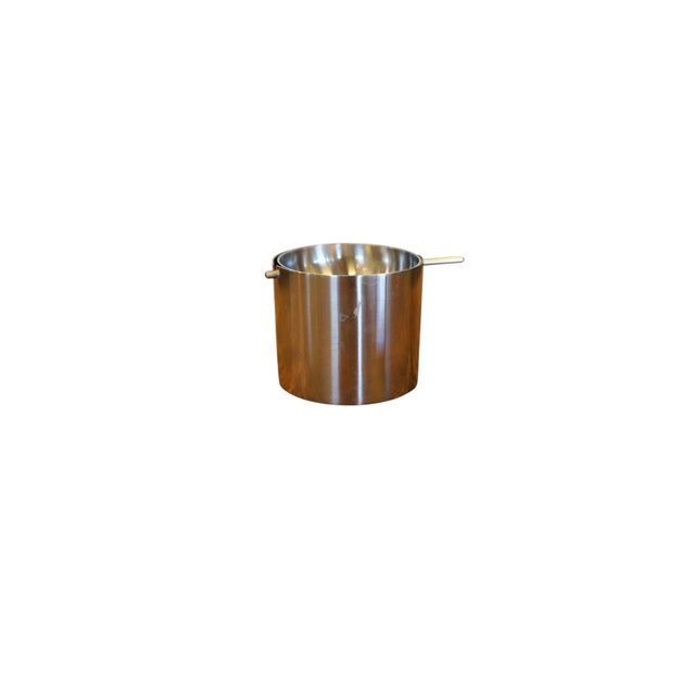 Stainless steel ashtray from Arne Jacobsen's classic Cylinda-line series for Danish Stelton. The austere cylinder shape...